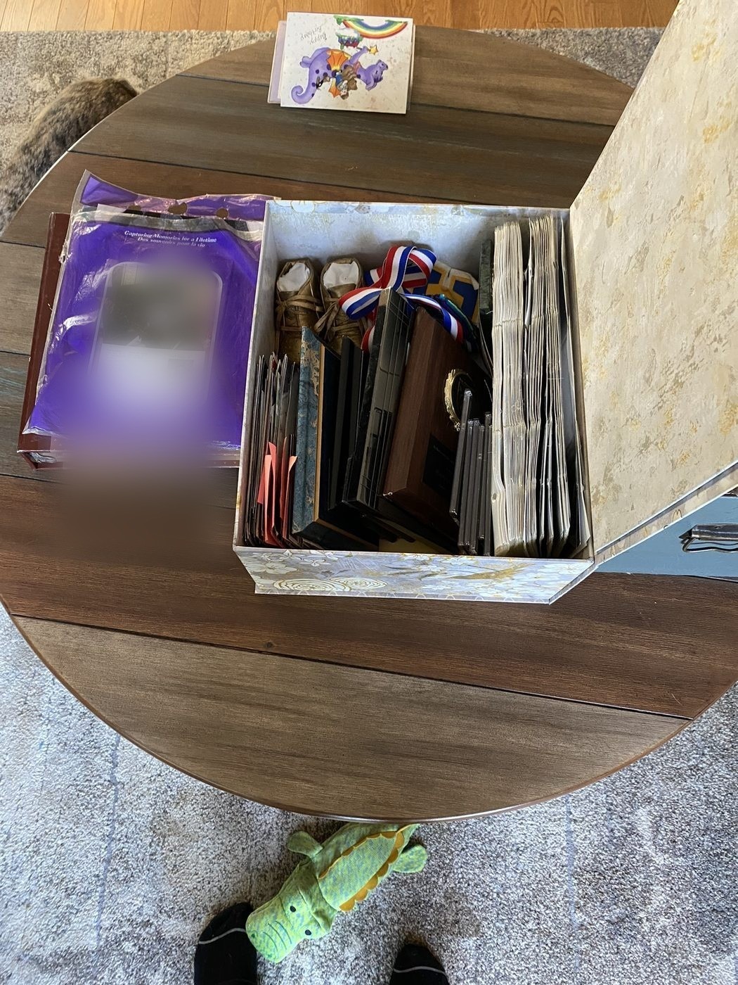 The same belongings after, sorted and stored with care.
